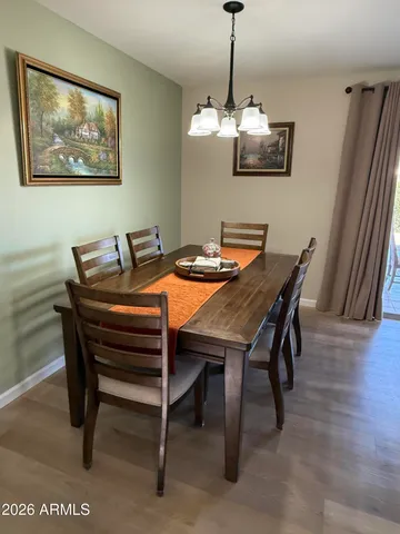 a view of a dining room with furniture