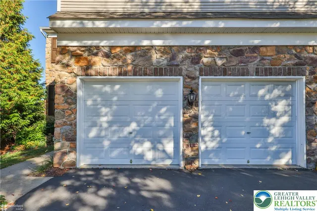a living room with furniture and a stair