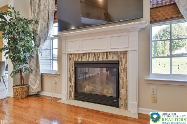 a spacious bathroom with a double vanity sink and a mirror