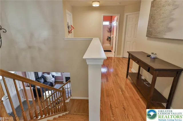 a view of a house with backyard sitting area and garden