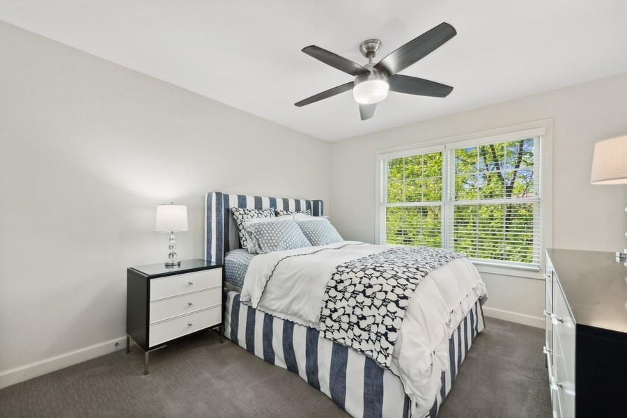 1918 Lynn Circle Libertyville, IL 60048 - Photo 12 of 17 a bedroom with a bed and a large window