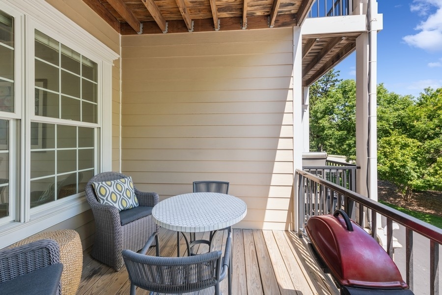 1918 Lynn Circle Libertyville, IL 60048 - Photo 6 of 17 a view of a chair and table in the balcony