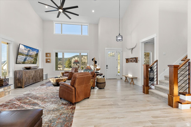 1210 East Bristle Cone Road Pine Valley, UT 84781 - Photo 4 of 54 Living area featuring light wood-style floors, a high ceiling, ceiling fan, and recessed lighting