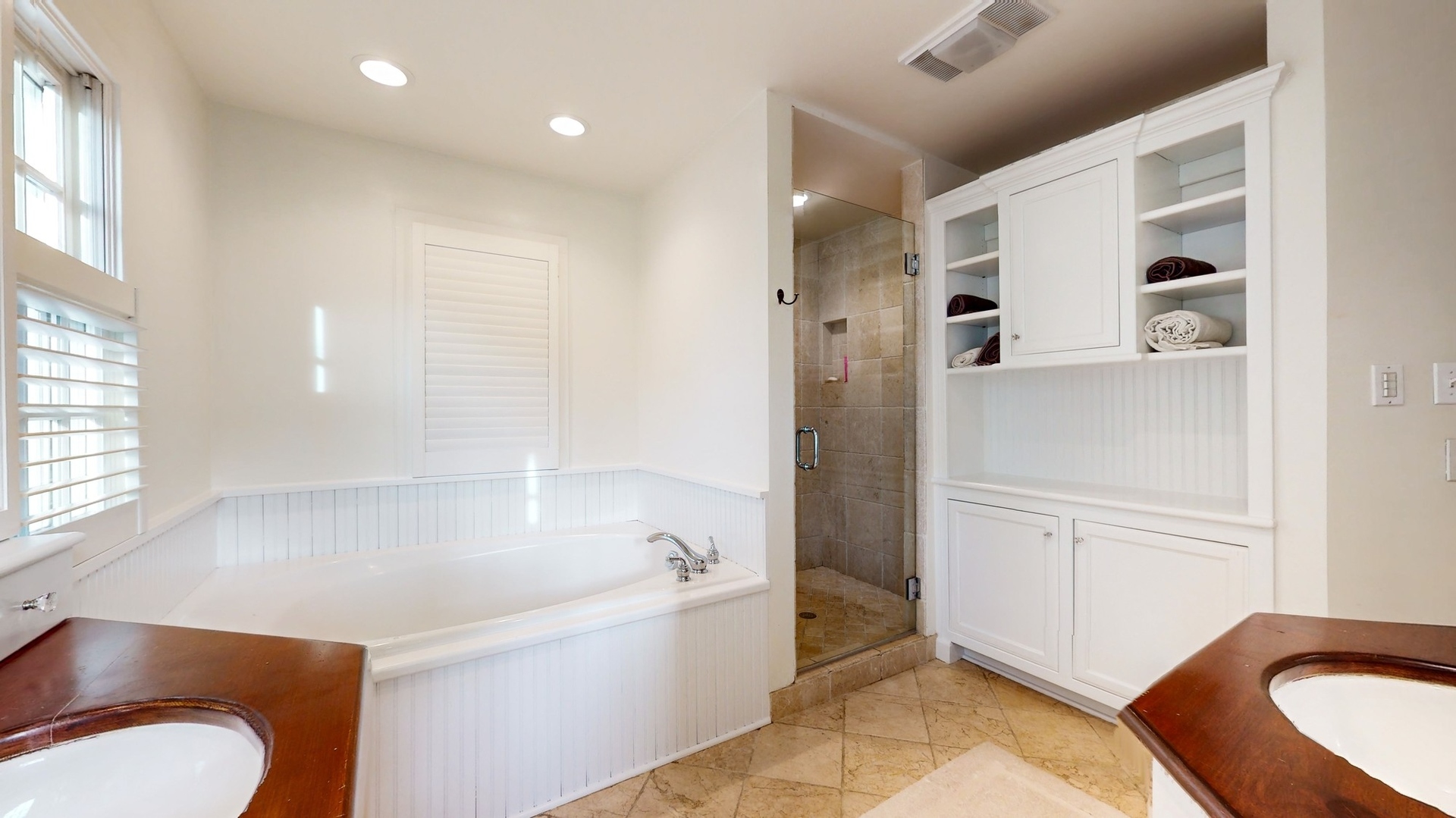 687 Hill Road Winnetka, IL 60093 - Photo 26 of 54 a bathroom with a bathtub and a shower