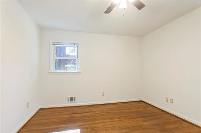 a view of a house with a yard and garage