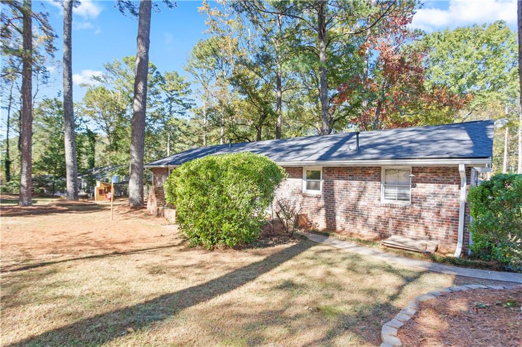 4433 Locksley Road Tucker, GA 30084 - Photo 29 of 33 a view of a backyard of the house