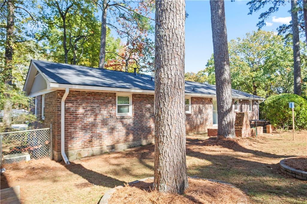 4433 Locksley Road Tucker, GA 30084 - Photo 30 of 33 a view of house with a outdoor space