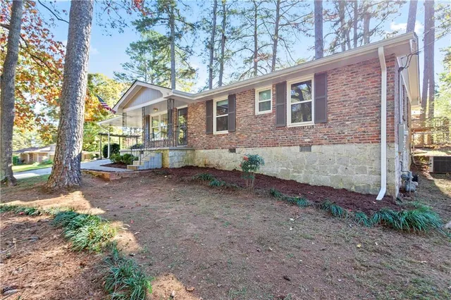 front view of a house with a trees