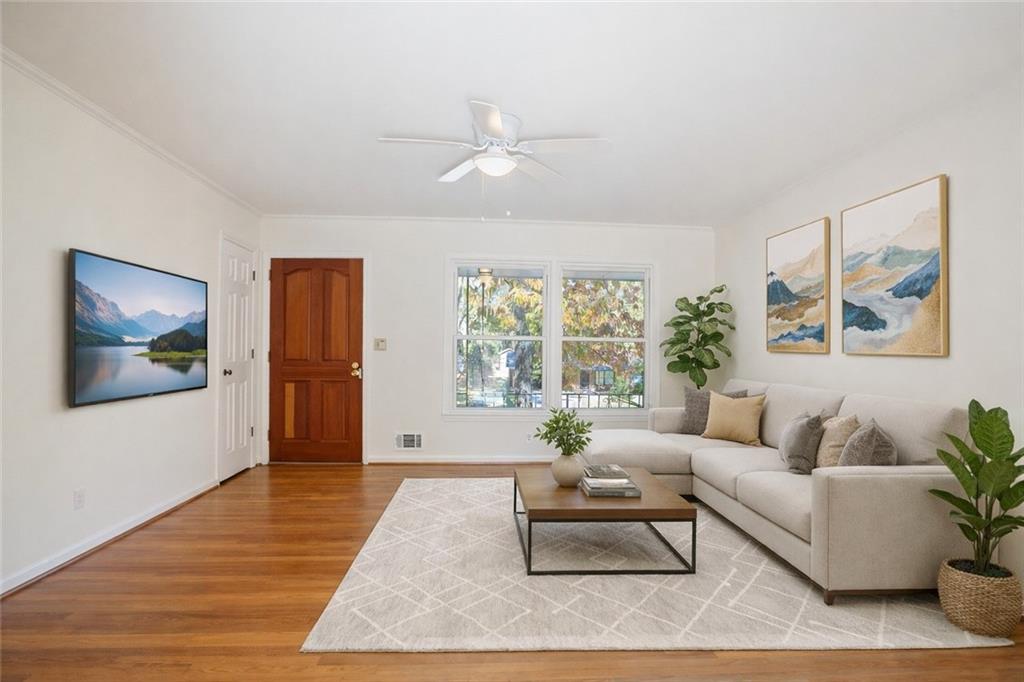 4433 Locksley Road Tucker, GA 30084 - Photo 5 of 33 a living room with furniture and a large window