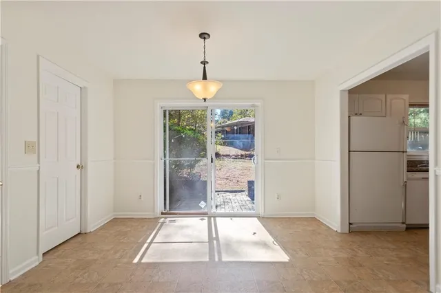 a very nice looking room with a chandelier fan