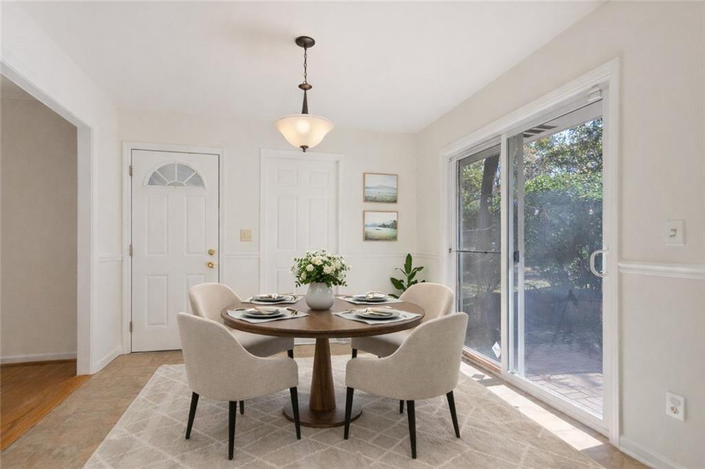 4433 Locksley Road Tucker, GA 30084 - Photo 8 of 33 a view of a dining room with furniture window and outside view