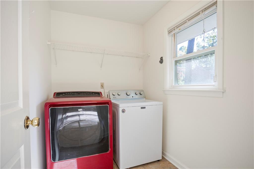 4433 Locksley Road Tucker, GA 30084 - Photo 9 of 33 a utility room with dryer and washer