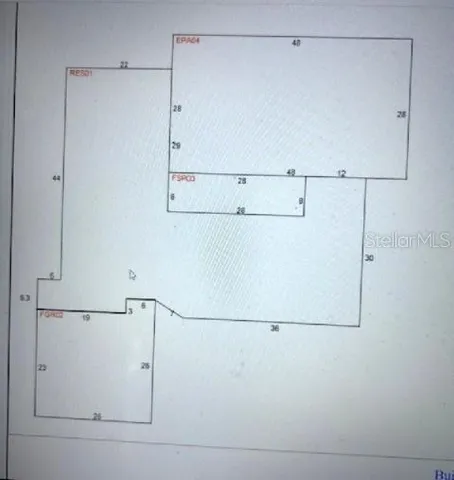 a yard with lots of green space and trees