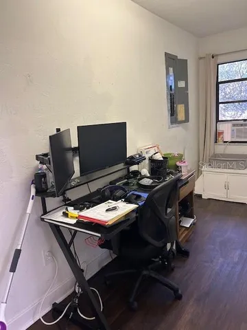 a view of a workspace with furniture
