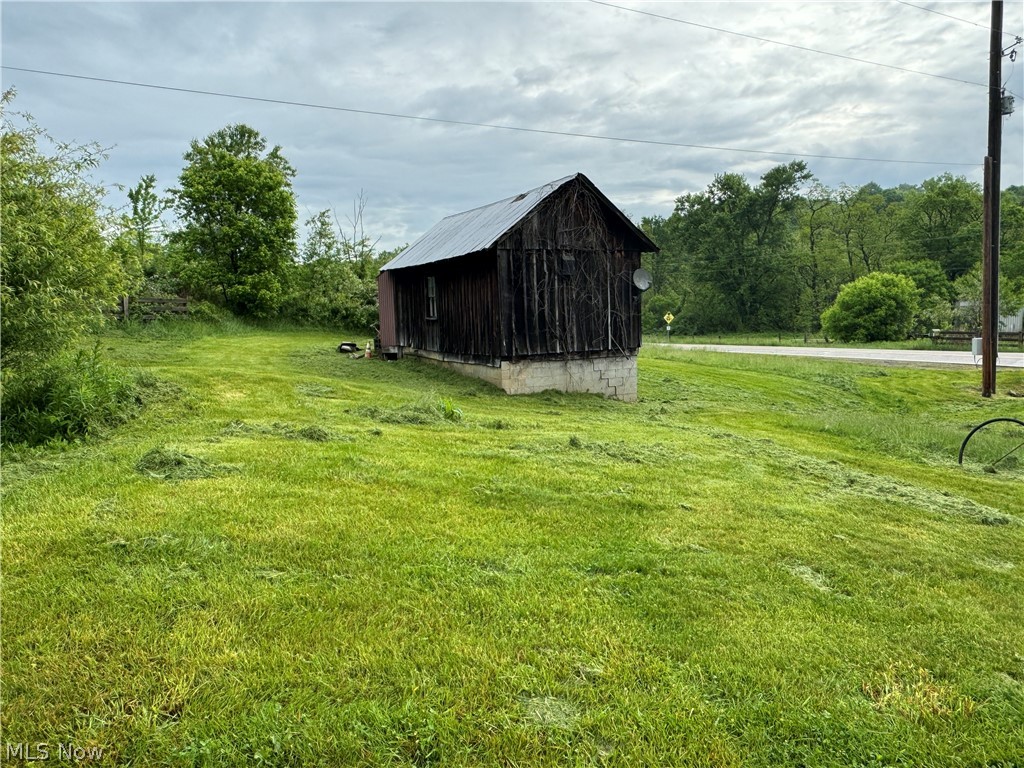 9395 Center Road Blue Rock, OH 43720 - Photo 5 of 13 View of yard featuring a storage shed