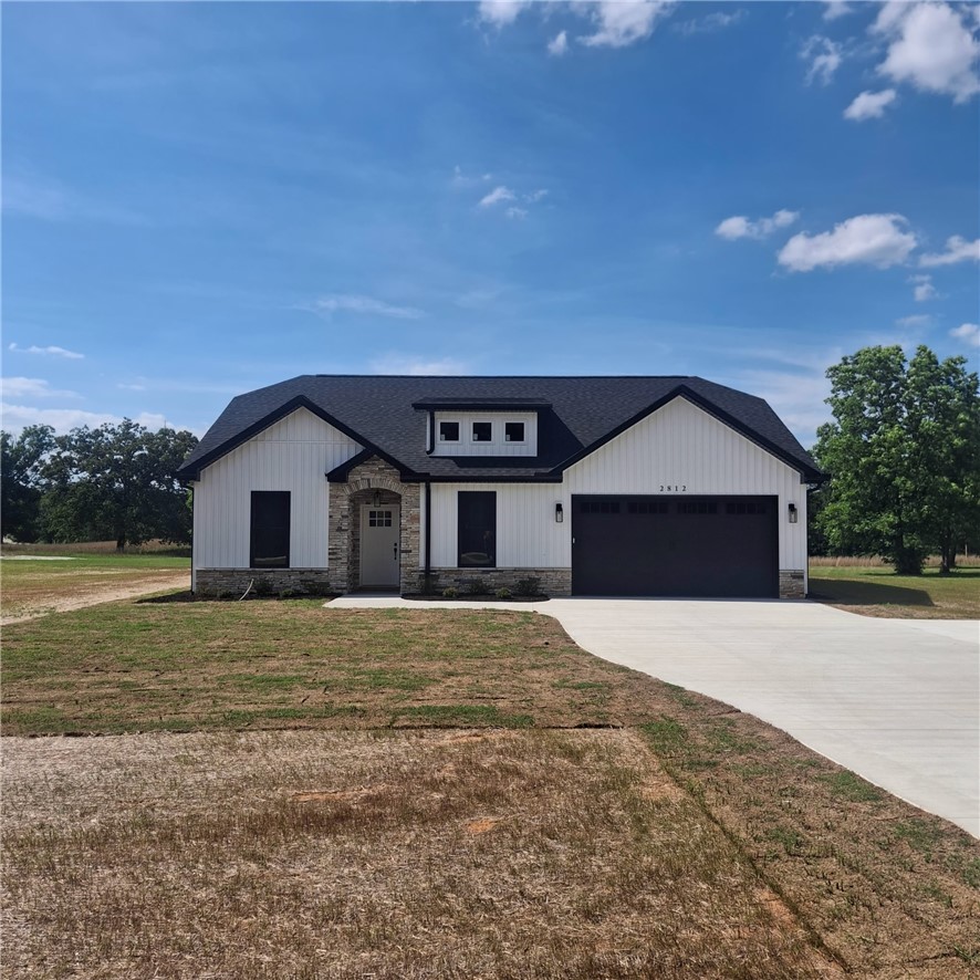 2812 Smith McGee Road Iva, SC 29655 - Photo 25 of 26 A newly constructed residence features a striking facade of stone and white siding.