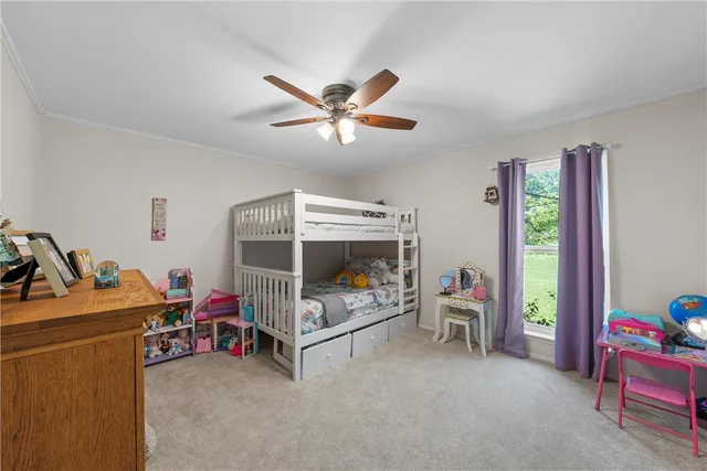 a spacious bathroom with a sink and a mirror