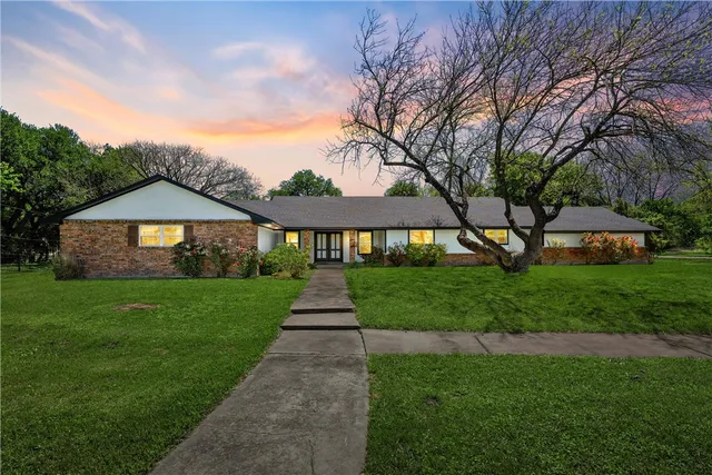 a front view of a house with a porch