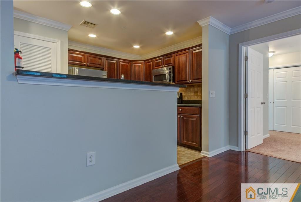 358 Rector Street, Unit 607 Perth Amboy, NJ 08861 - Photo 17 of 25 a view of empty room with wooden floor