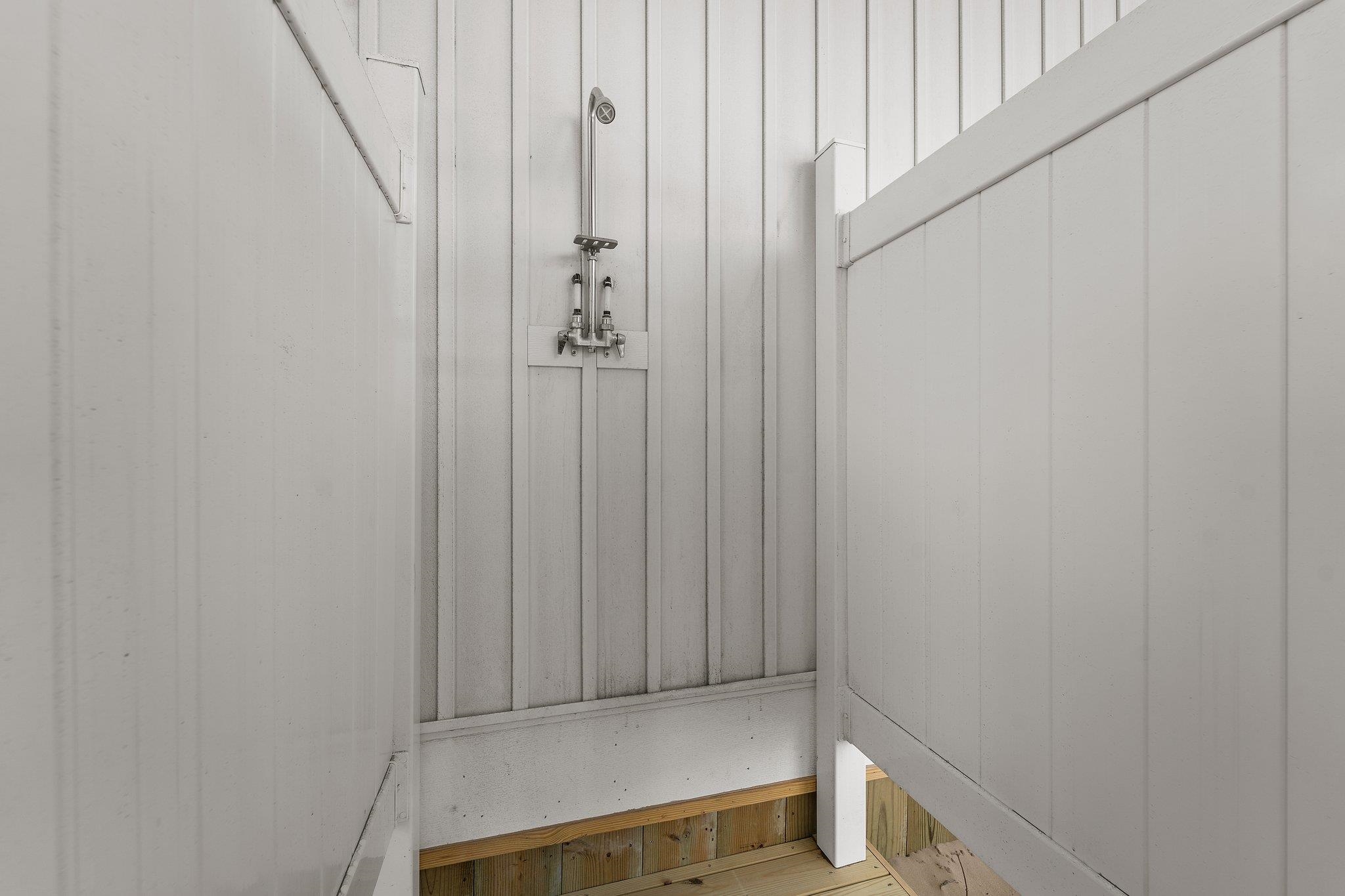 2201 Ocean Pearl Road, Unit 12 Corolla, NC 27927 - Photo 33 of 39 outdoor shower