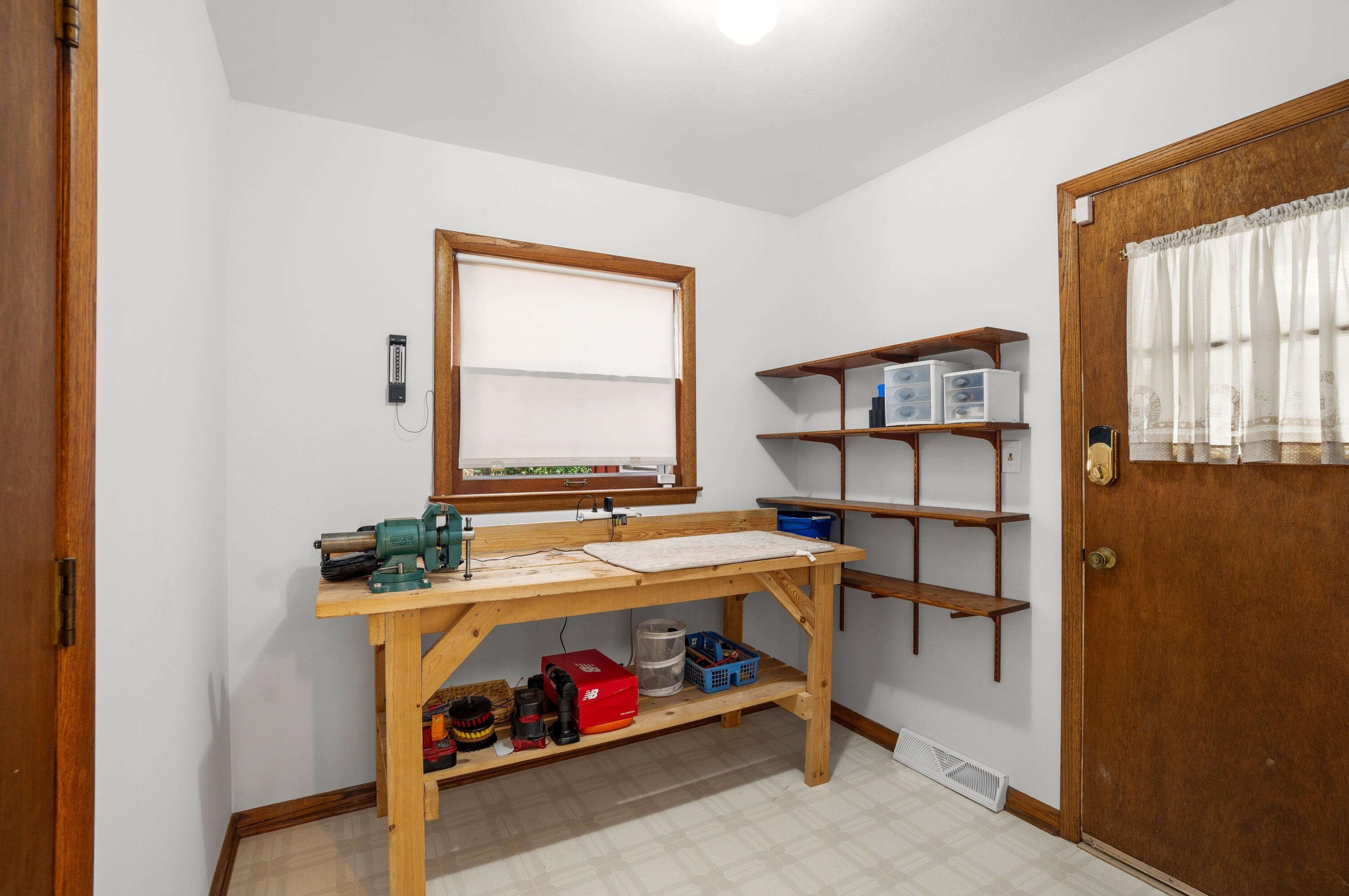 4133 Lexington Avenue Caledonia, WI 53404 - Photo 15 of 42 Mudroom between garage and 3 season room