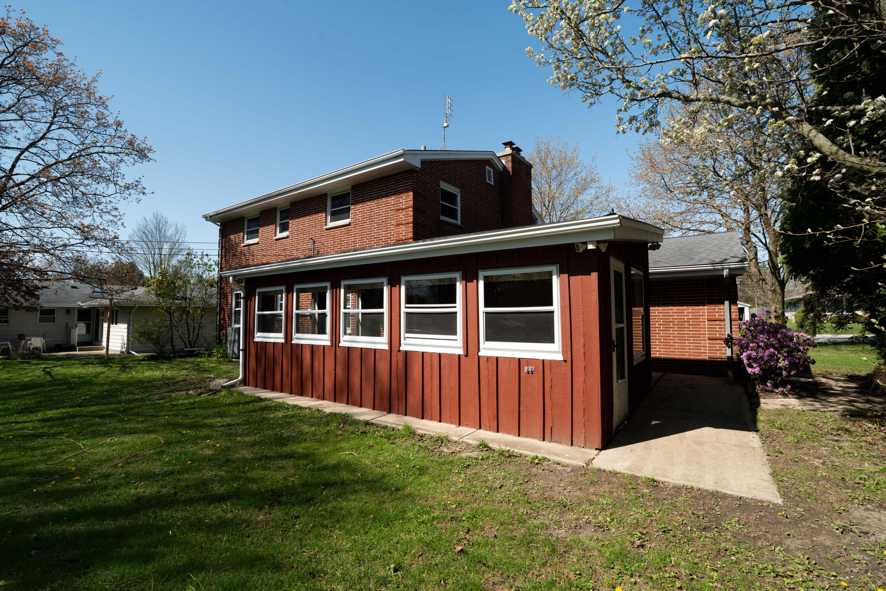 4133 Lexington Avenue Caledonia, WI 53404 - Photo 19 of 42 Exterior 3 season room - freshly painted