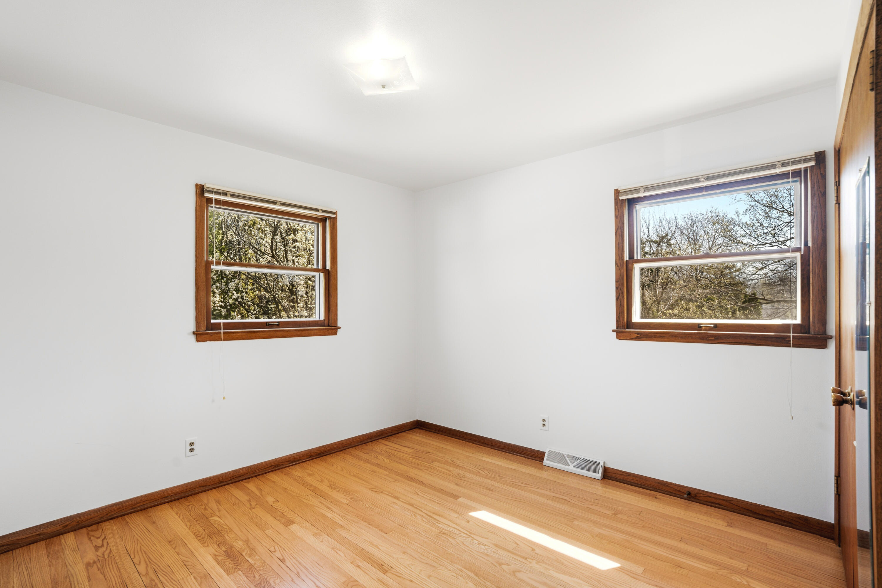 4133 Lexington Avenue Caledonia, WI 53404 - Photo 30 of 42 Northeast bedroom - new hardwood floor
