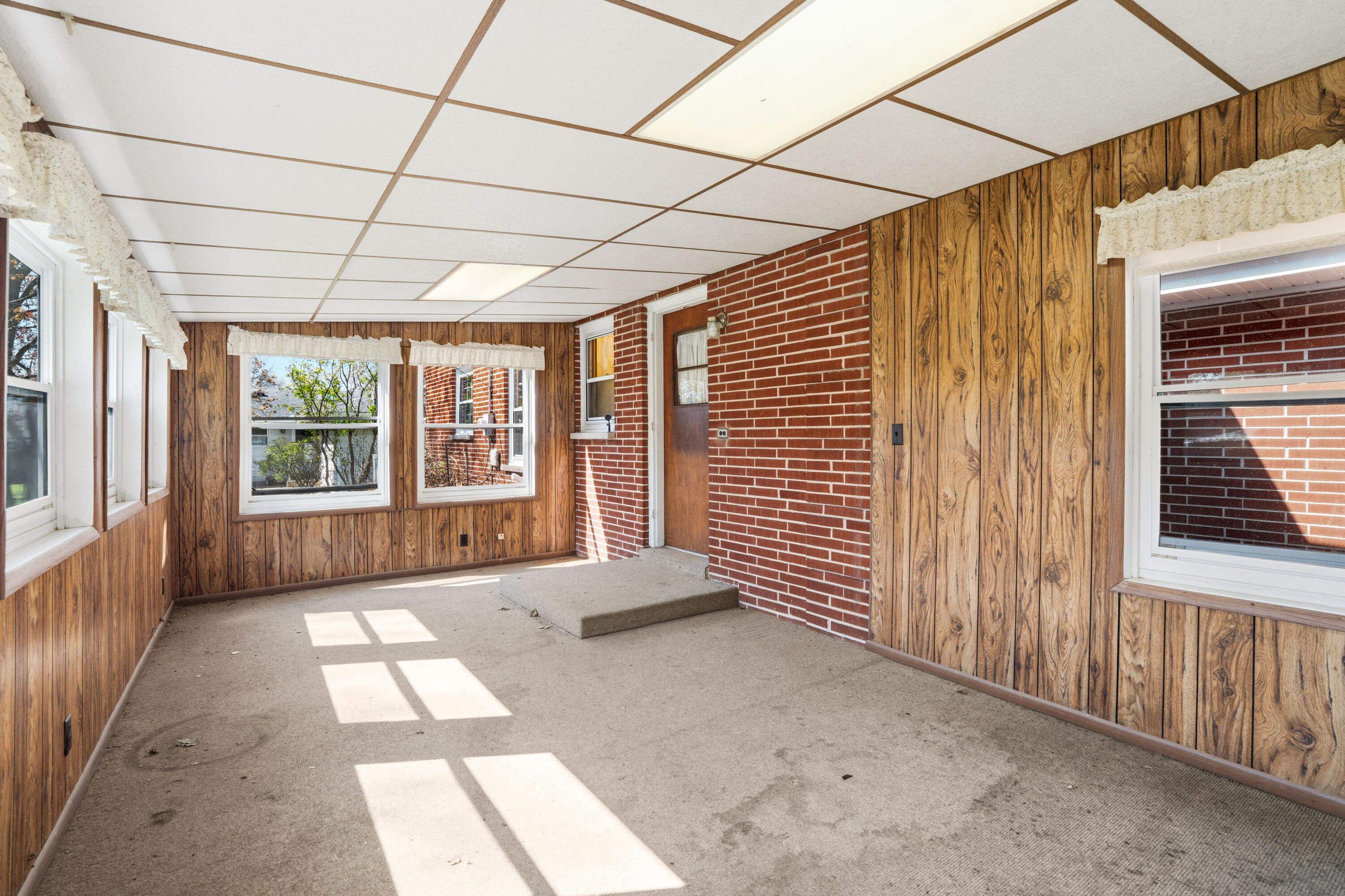 4133 Lexington Avenue Caledonia, WI 53404 - Photo 35 of 42 3 season room - carpet scheduled for replacement