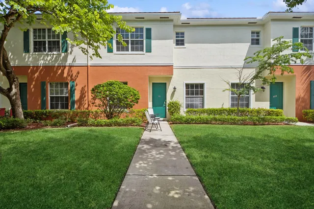 front view of a house and a yard