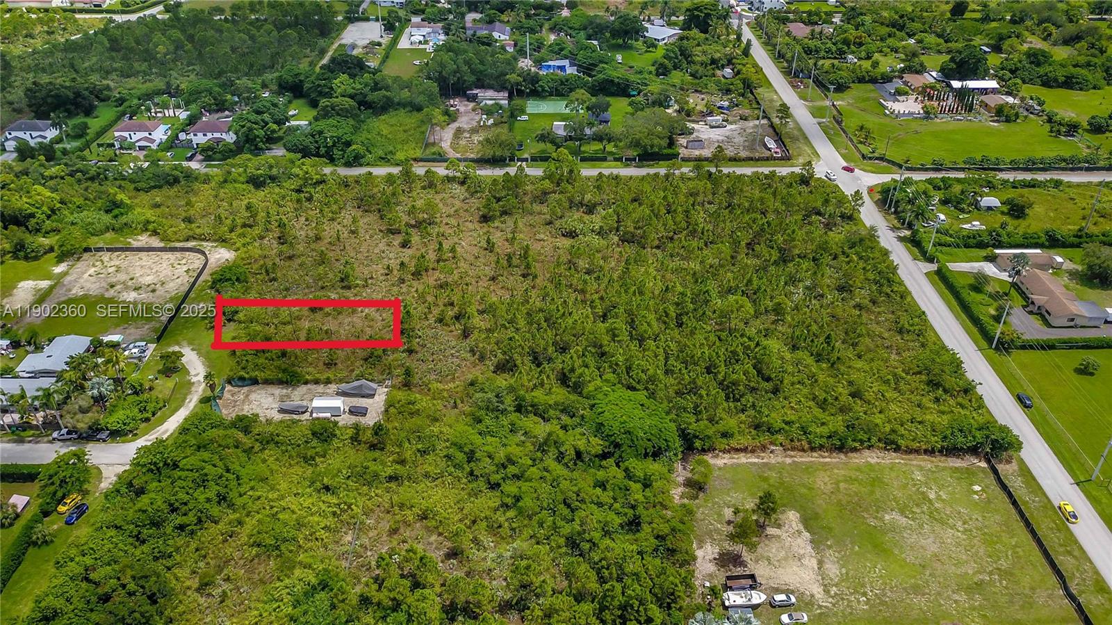 12251 Southwest 230th Street Miami, FL 33170 - Photo 10 of 13 a bird view of a house with a garden