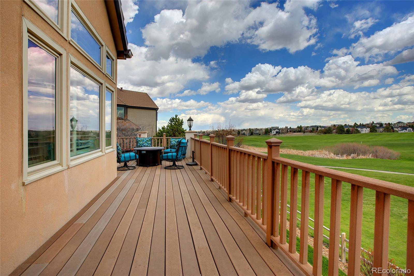 7768 Edgewater Court Lone Tree, CO 80124 - Photo 33 of 39 a view of a balcony with wooden floor