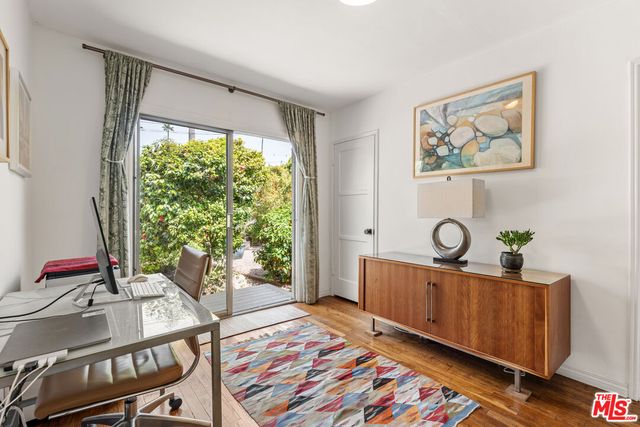 a view of a plant with a tree