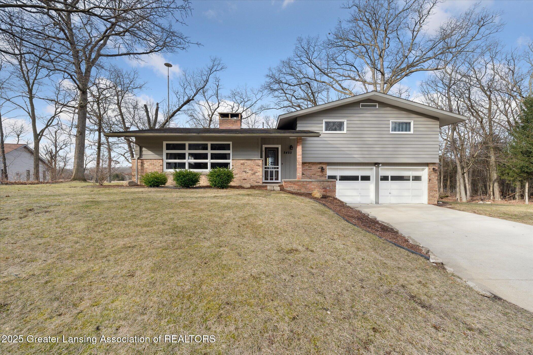 8480 Riverest Drive Portland, MI 48875 - Photo 1 of 48 Front