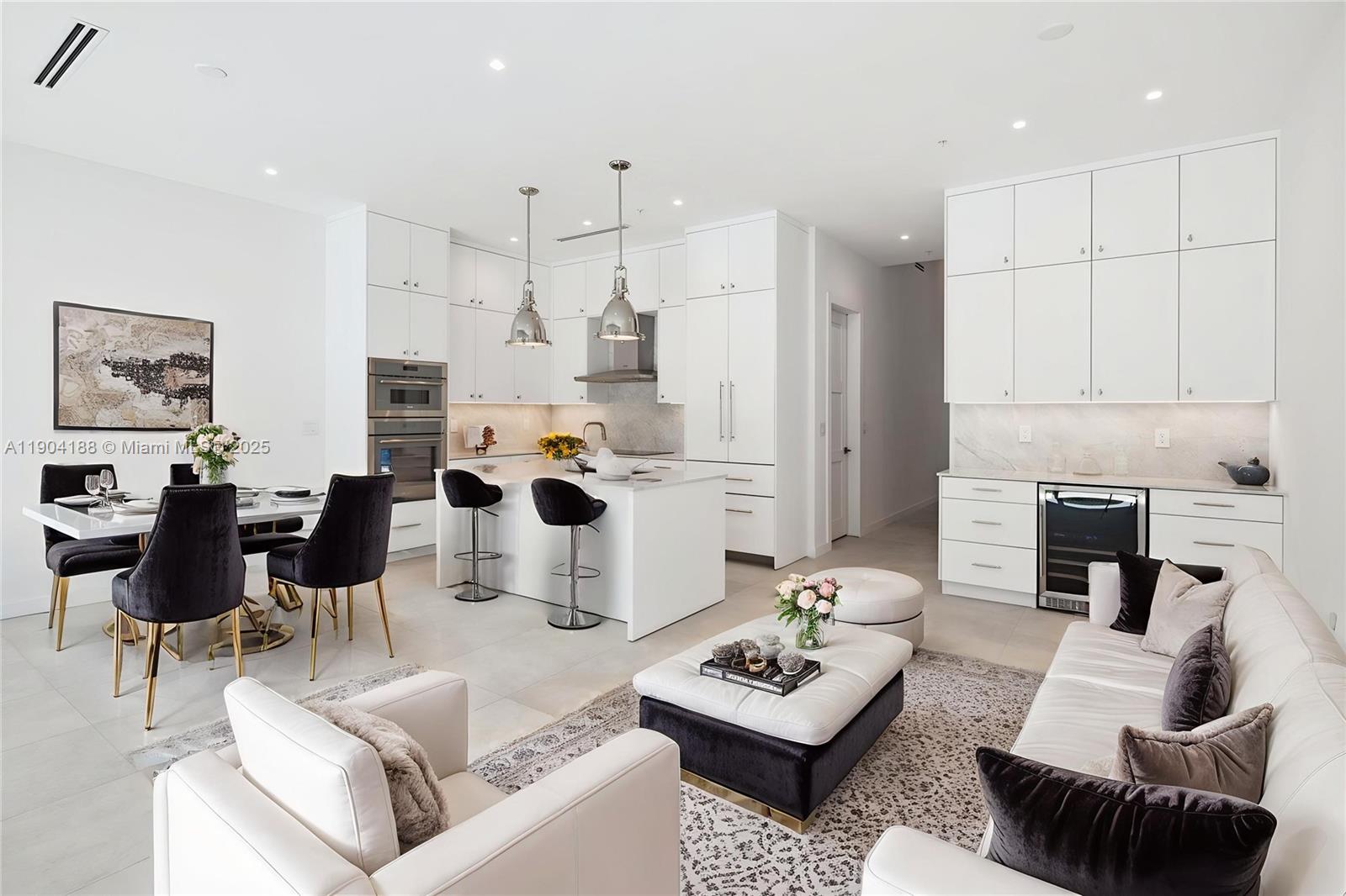 554 North Riverside Drive, Unit B Pompano Beach, FL 33062 - Photo 11 of 48 a living room with furniture and a fireplace