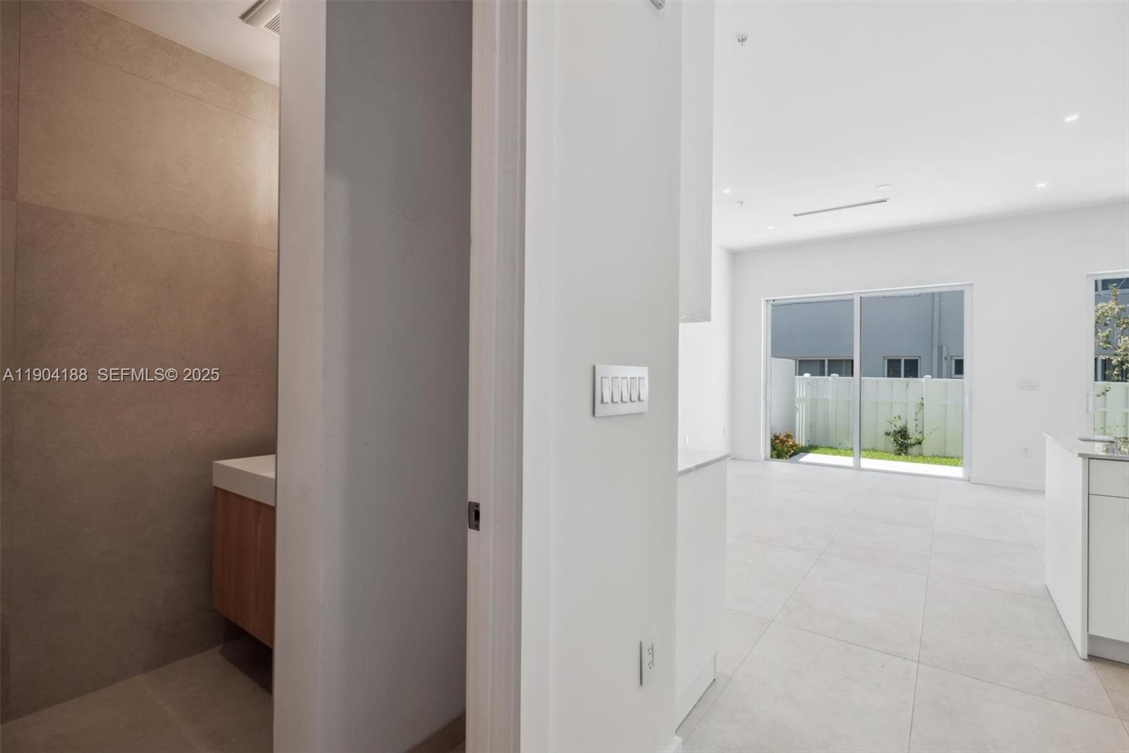554 North Riverside Drive, Unit B Pompano Beach, FL 33062 - Photo 22 of 48 a view of a hallway with wooden shelves