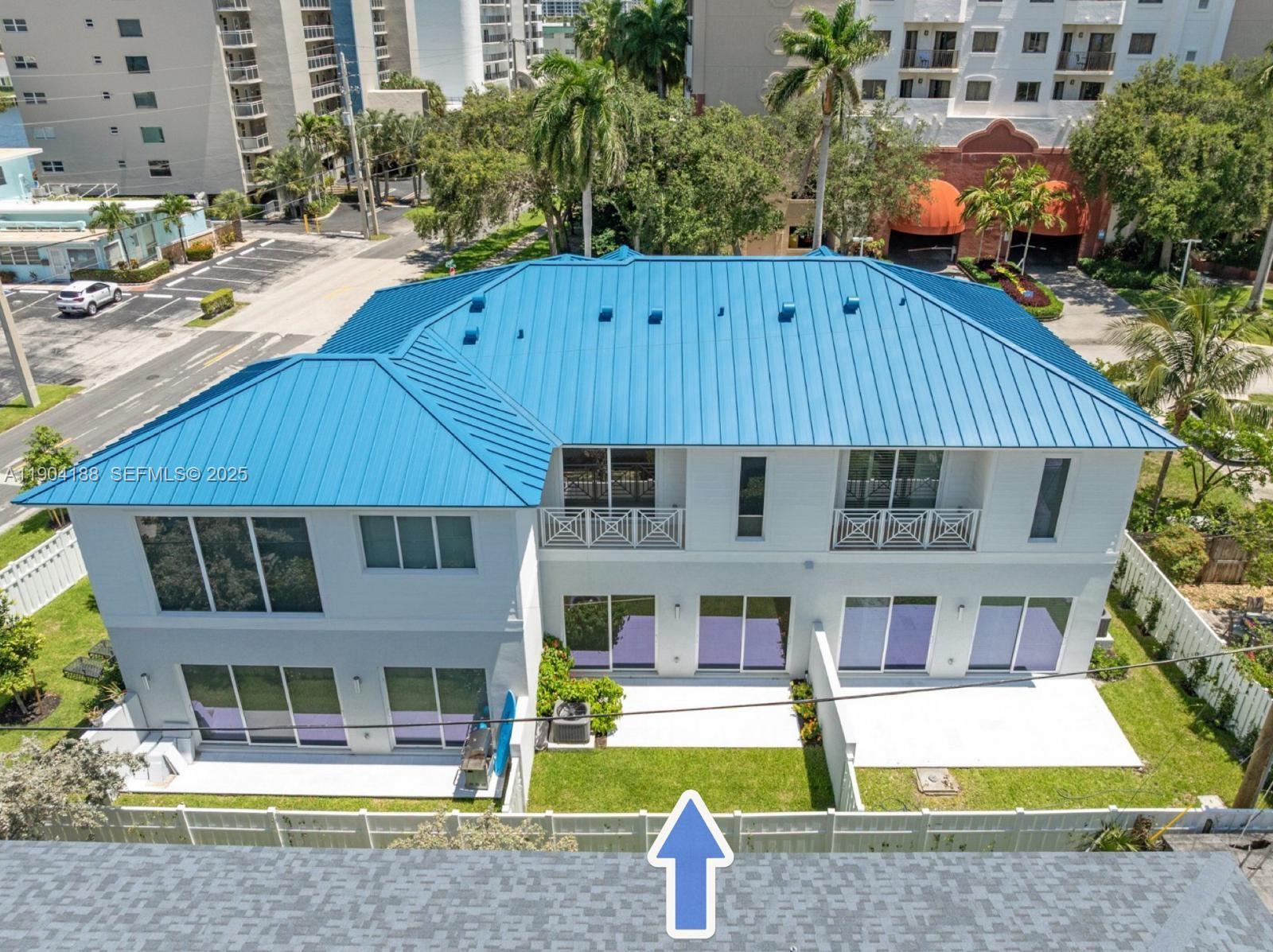 554 North Riverside Drive, Unit B Pompano Beach, FL 33062 - Photo 3 of 48 a aerial view of a house with swimming pool