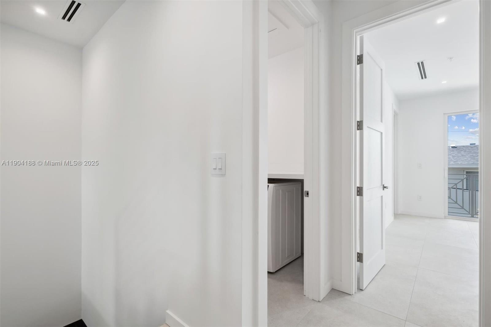 554 North Riverside Drive, Unit B Pompano Beach, FL 33062 - Photo 34 of 48 a view of a hallway with closet and a bathroom