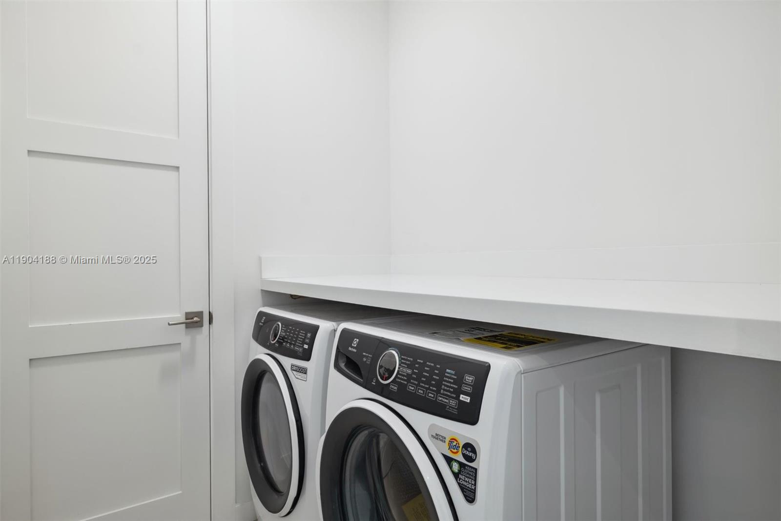 554 North Riverside Drive, Unit B Pompano Beach, FL 33062 - Photo 35 of 48 a utility room with dryer and washer