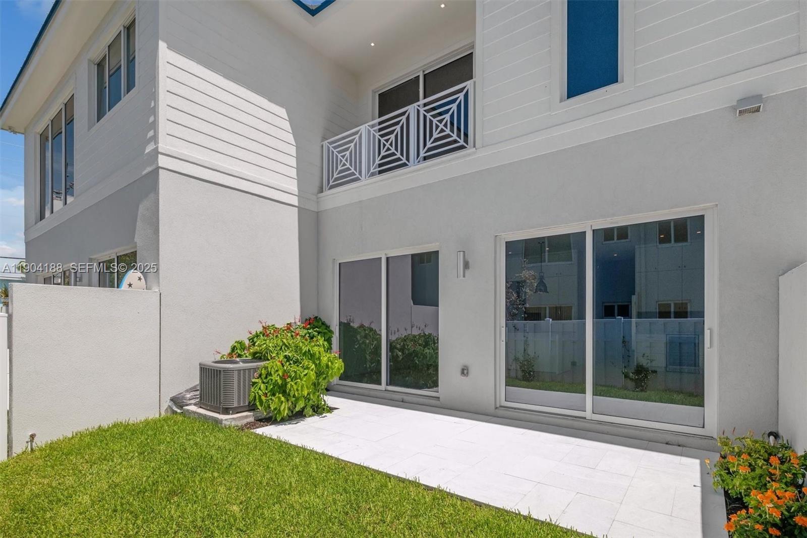 554 North Riverside Drive, Unit B Pompano Beach, FL 33062 - Photo 46 of 48 a view of front door of house and yard