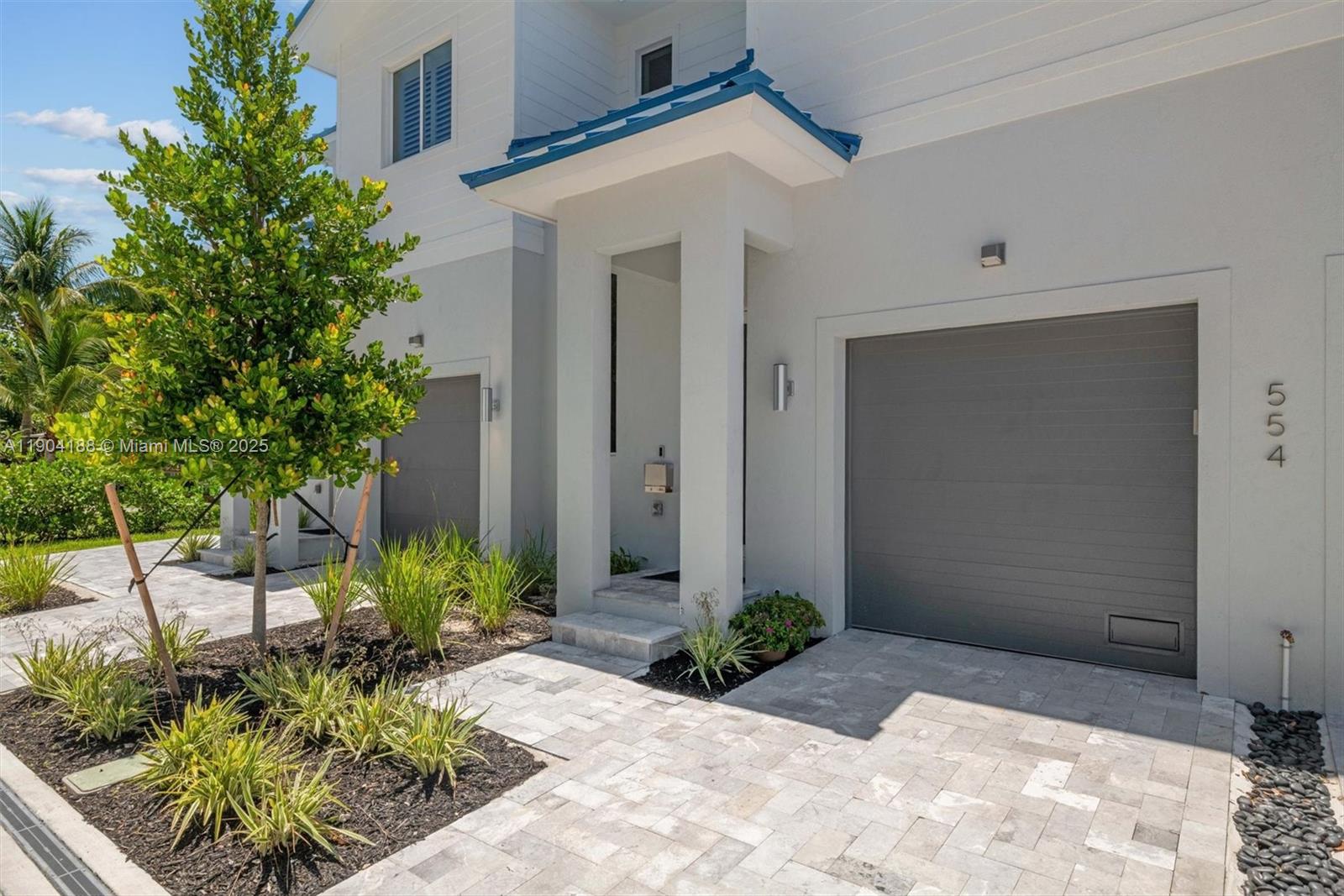 554 North Riverside Drive, Unit B Pompano Beach, FL 33062 - Photo 7 of 48 a view of a back yard of the house