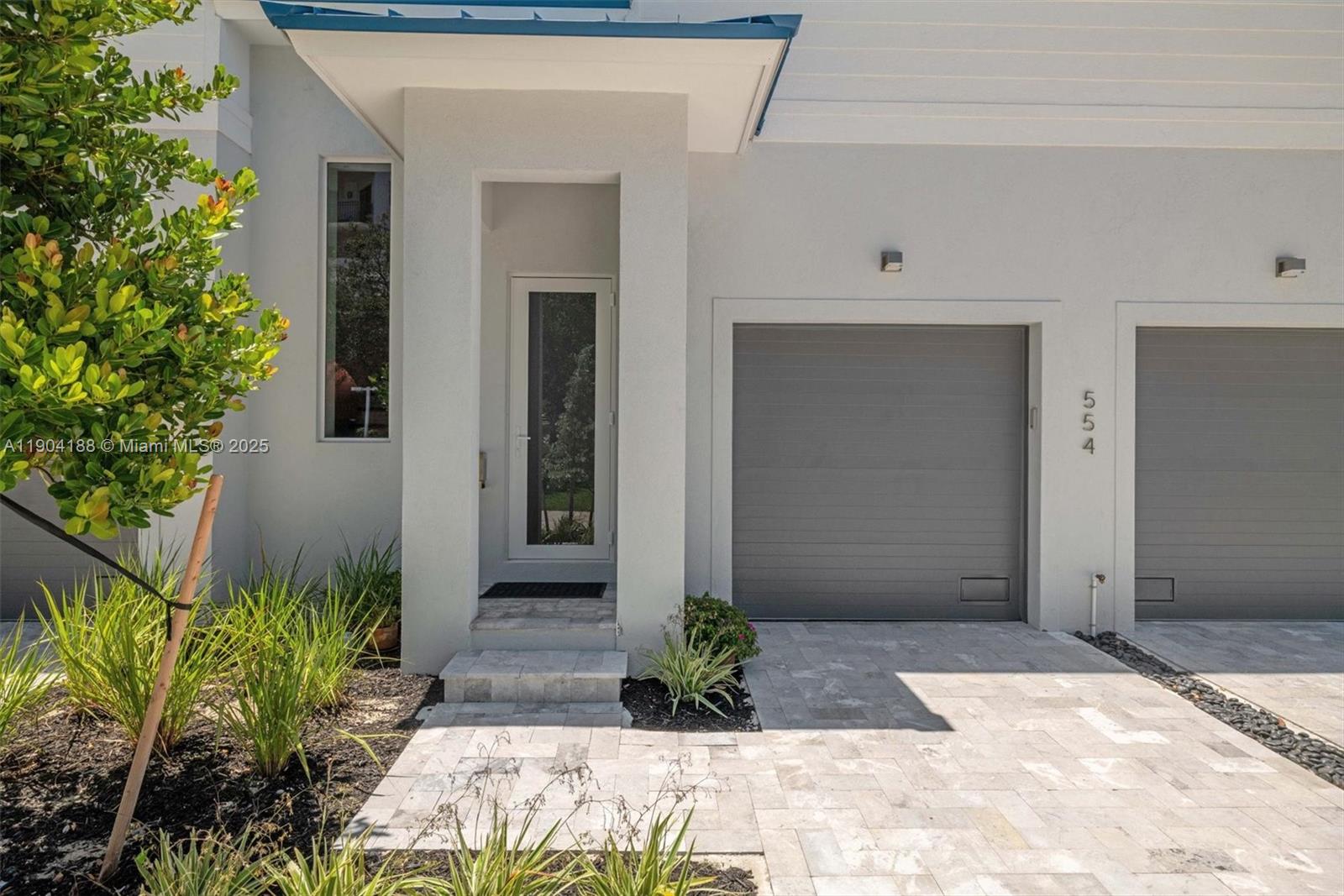 554 North Riverside Drive, Unit B Pompano Beach, FL 33062 - Photo 8 of 48 a front view of a house