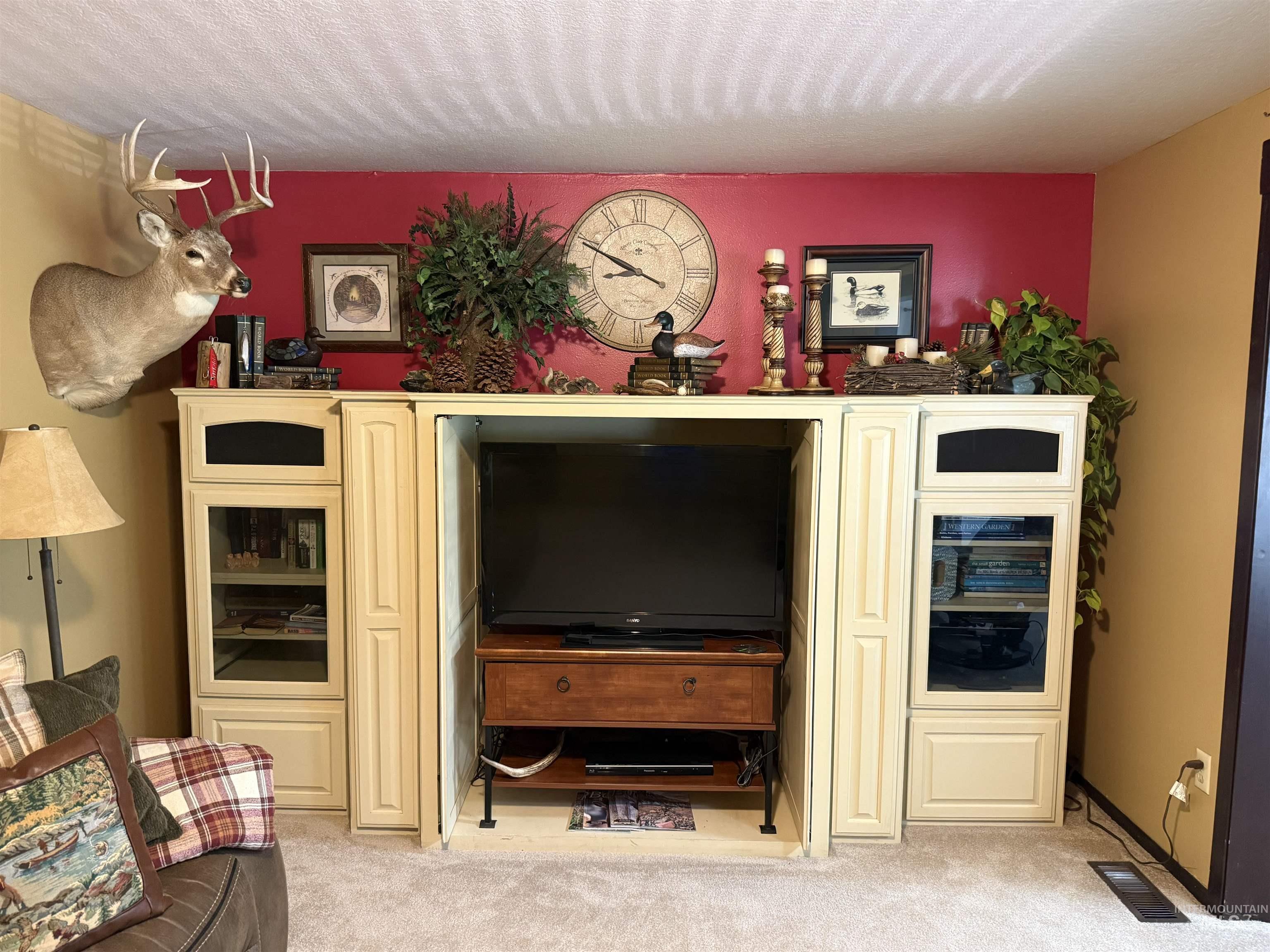 403 138th Street Orofino, ID 83544 - Photo 17 of 32 Living area with light carpet and a textured ceiling