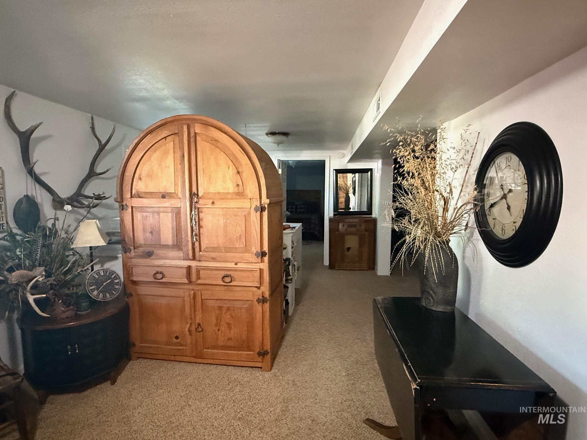 403 138th Street Orofino, ID 83544 - Photo 21 of 32 Corridor featuring light colored carpet