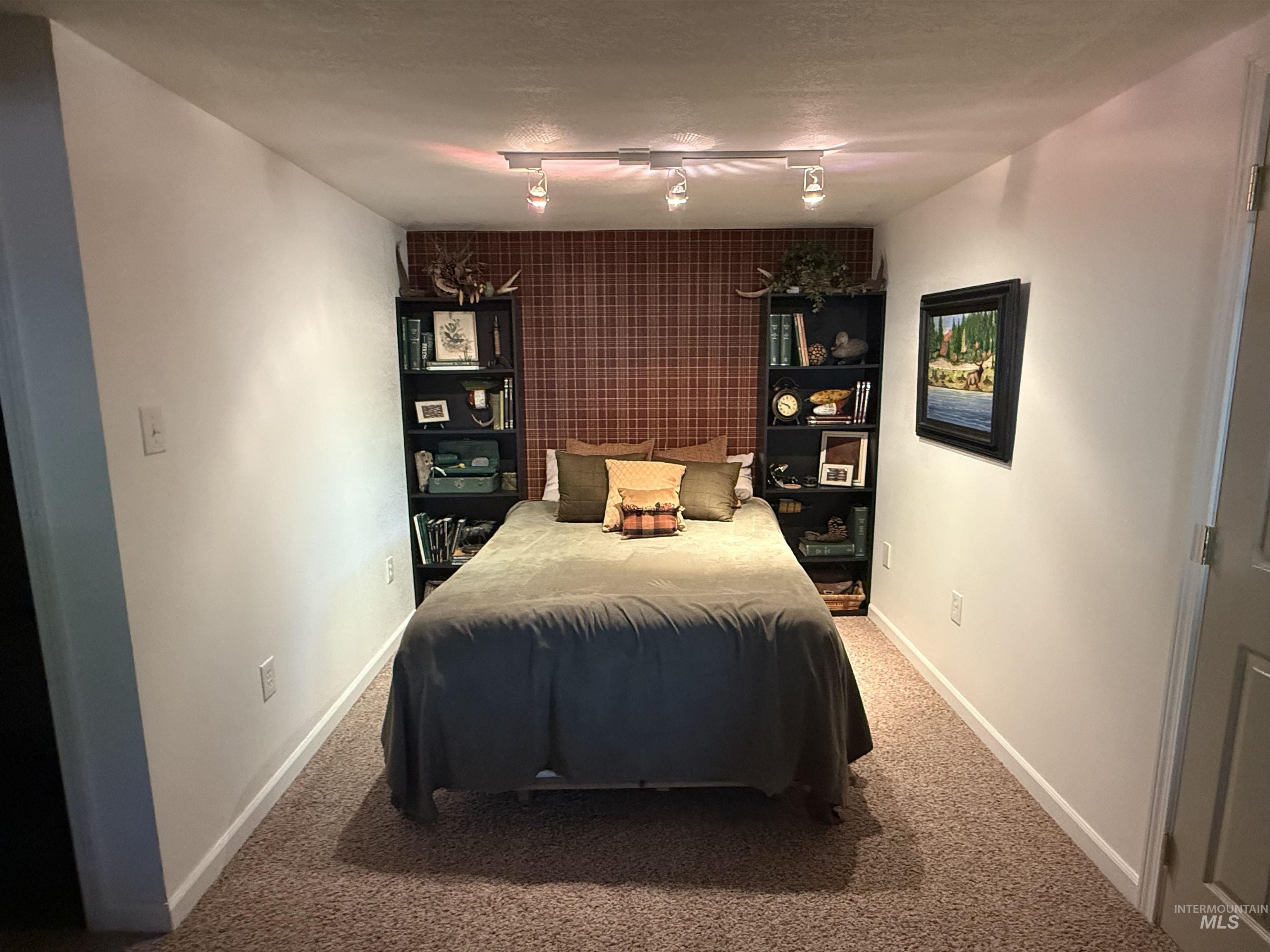 403 138th Street Orofino, ID 83544 - Photo 24 of 32 Carpeted bedroom featuring baseboards