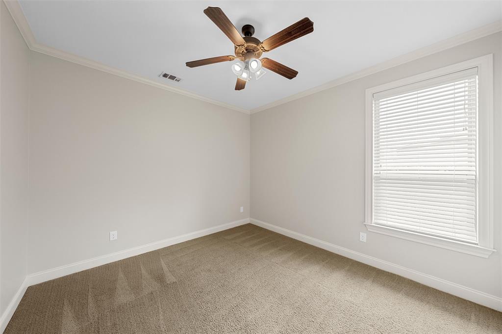 144 Ellis Farm Road Hewitt, TX 76643 - Photo 29 of 36 Carpeted room featuring a ceiling fan with integrated lighting, a window with horizontal blinds, neutral wall paint, and white trim