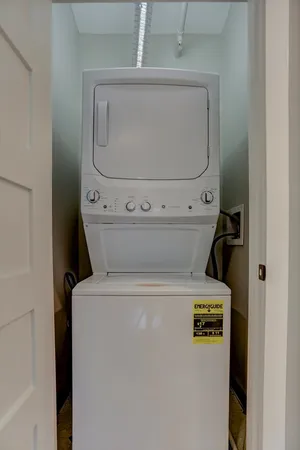 a bathroom with a toilet sink and shower