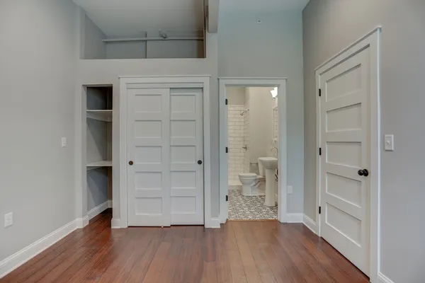 a view of a kitchen and wooden floor