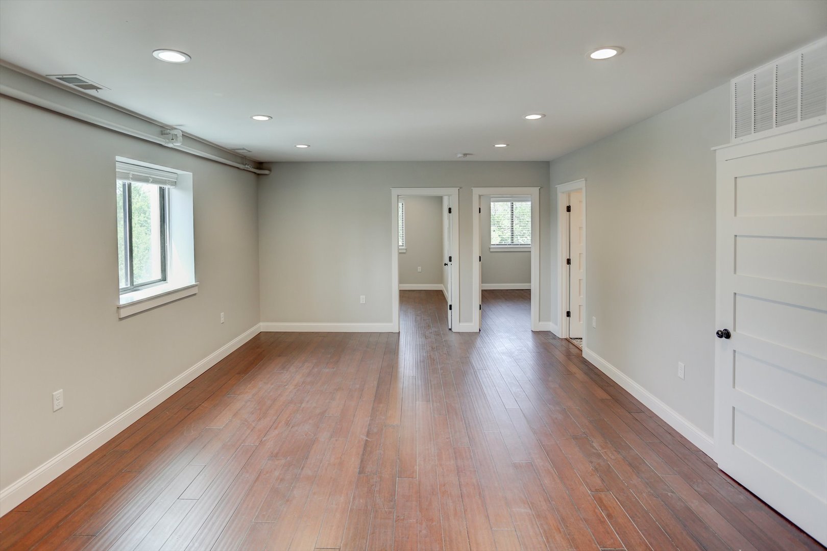 218 West Main Street Urbana, IL 61801 - Photo 49 of 96 a view of a room with wooden floors and window