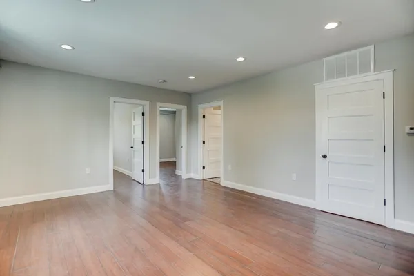 a room with lots of furniture and gym equipment