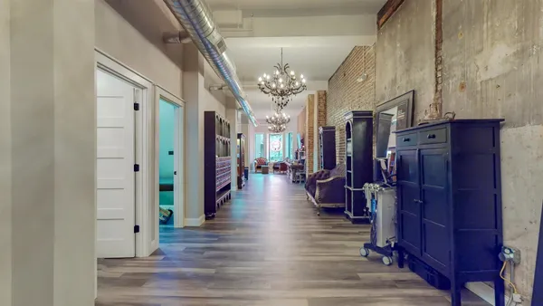 a kitchen with stainless steel appliances granite countertop a stove a refrigerator and a granite counter tops